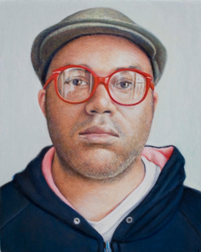 man with red glasses