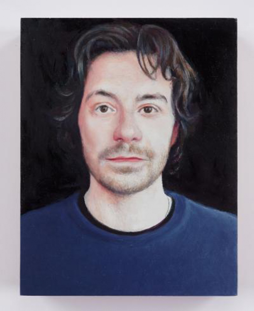 man with dark blue shirt