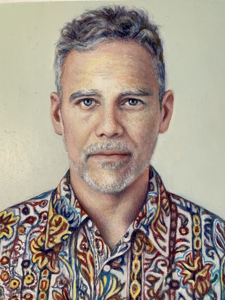 man with paisley shirt